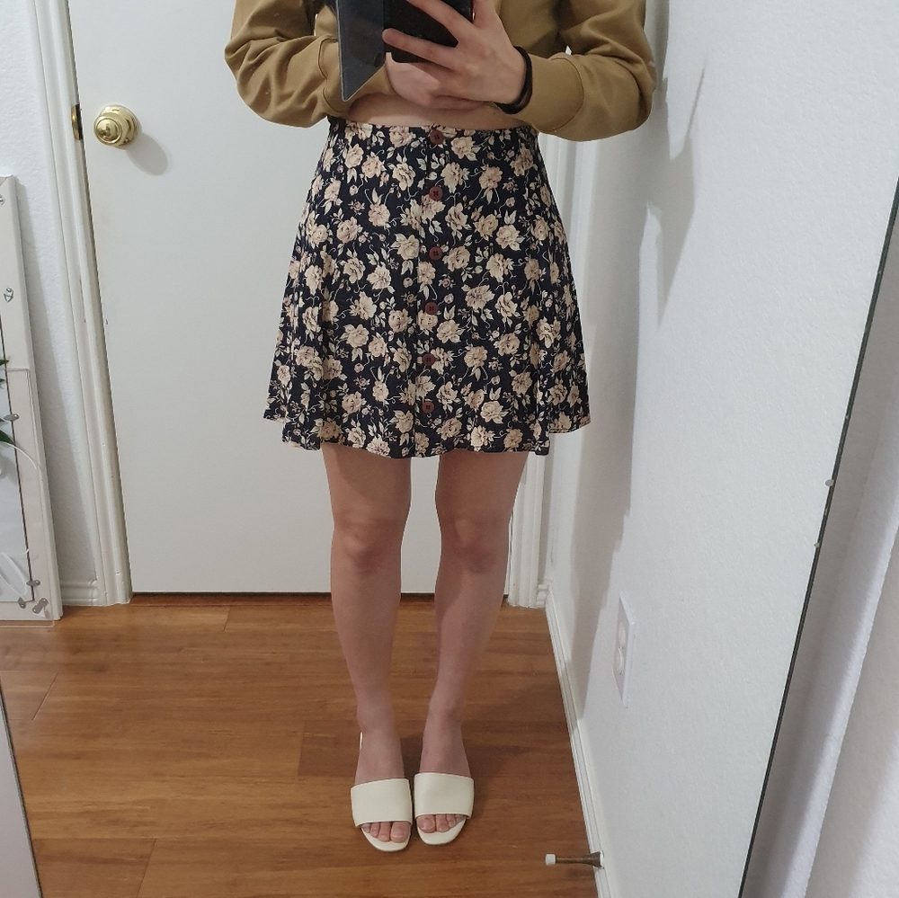Black floral mini skirt
